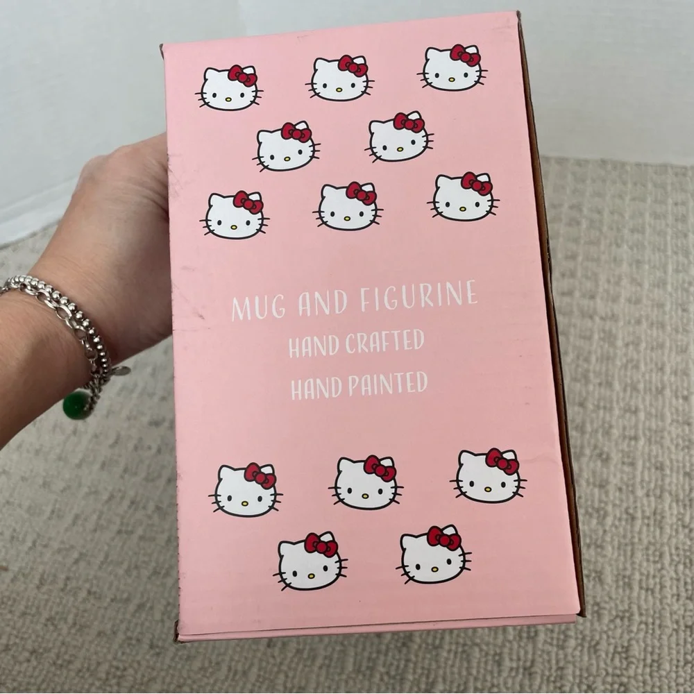 NIB hello kitty mug and figurine set